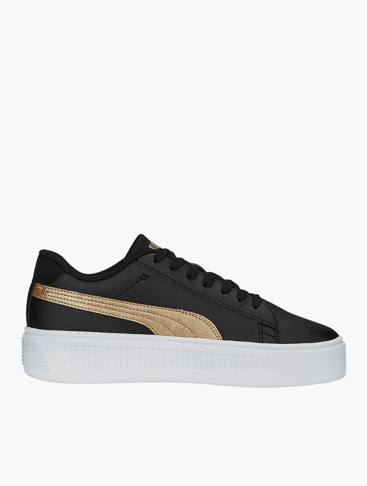 Black and top gold pumas europe